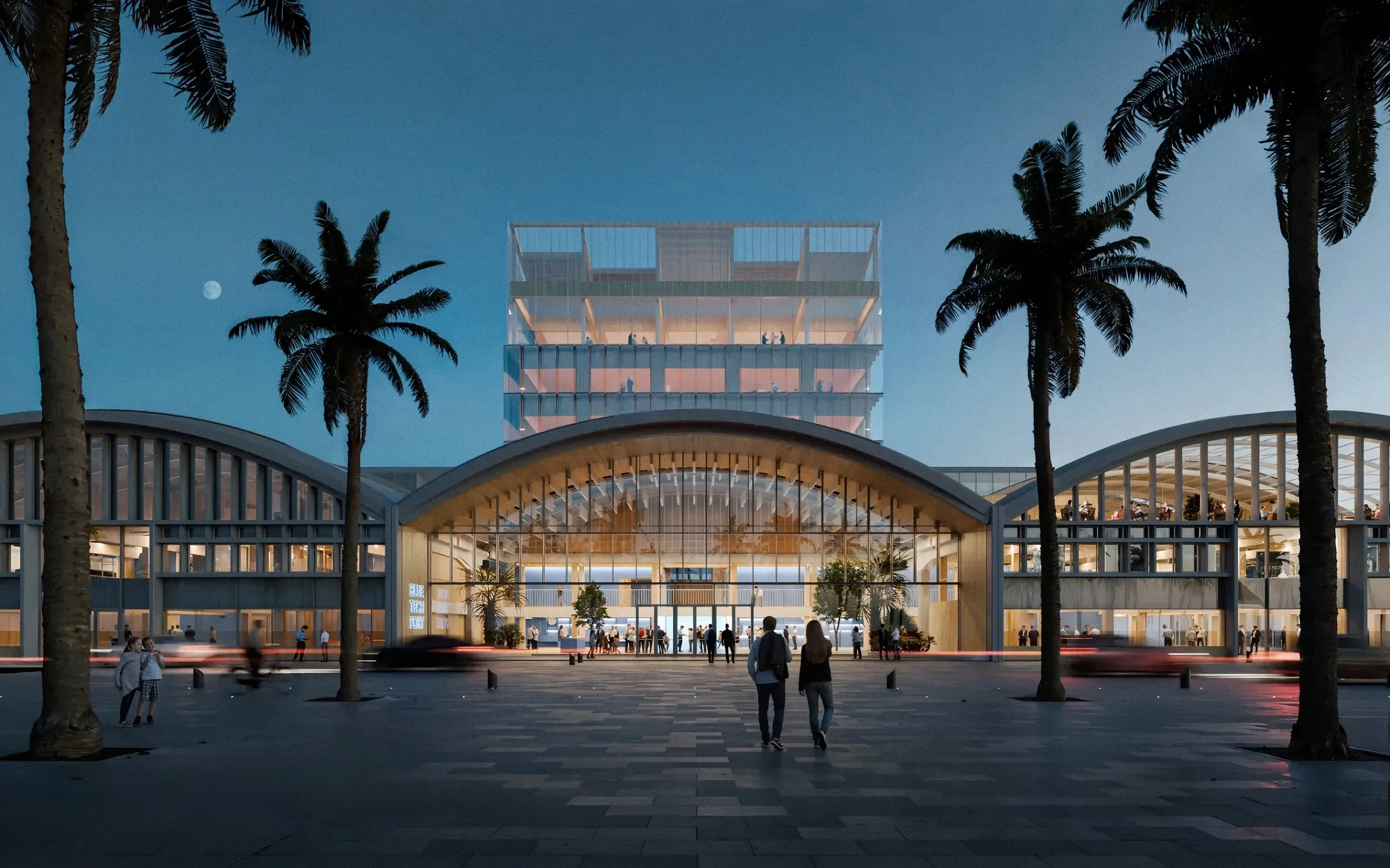 Render nocturno de un edificio portuario de naves con cubierta en arco y una torre acristalada, con una plaza de palmeras en primer plano y peatones caminando hacia la entrada.