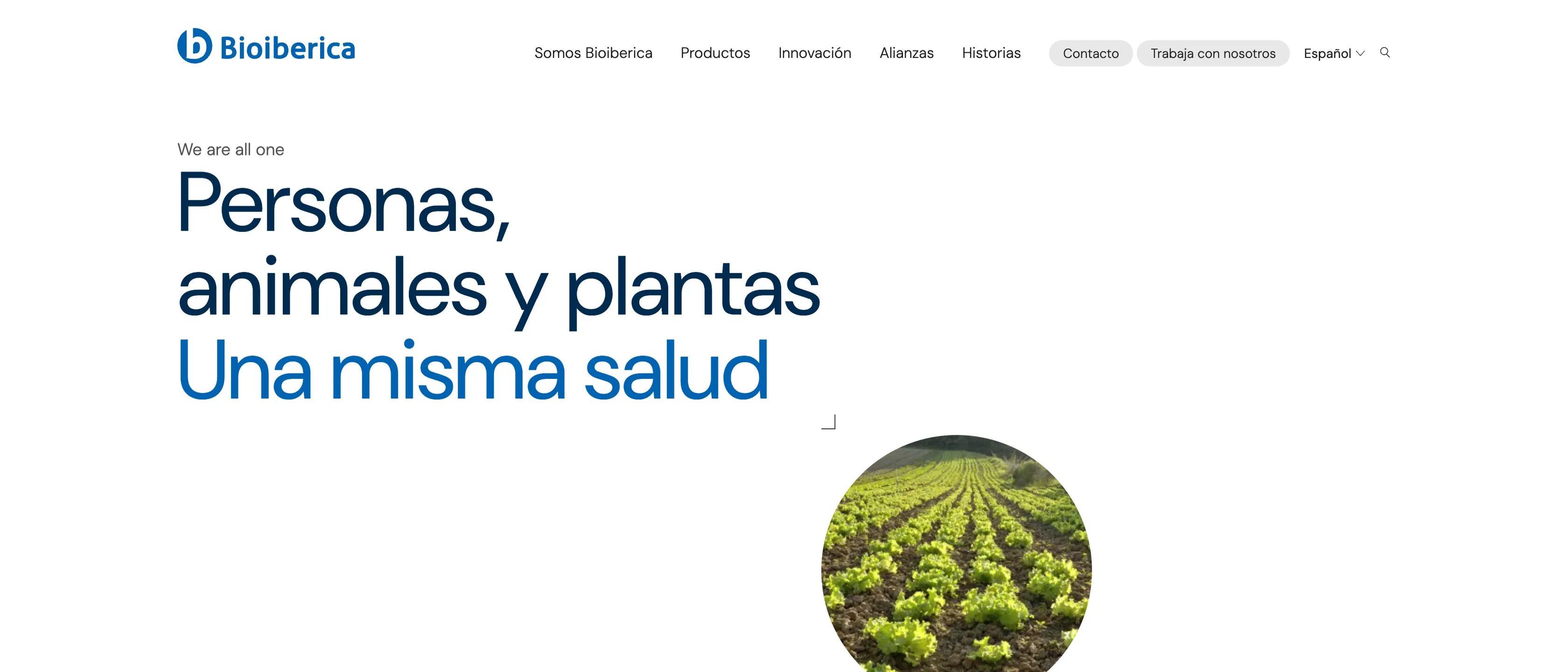 Portada de bioiberica.com: menú principal y el lema «Personas, animales y plantas. Una misma salud» junto a una imagen circular de un campo de lechugas